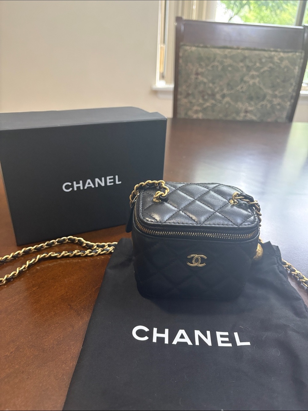 BRAND NEW! Chanel CC Bubble Vanity Case with Chain Mini Bag with dust bag.